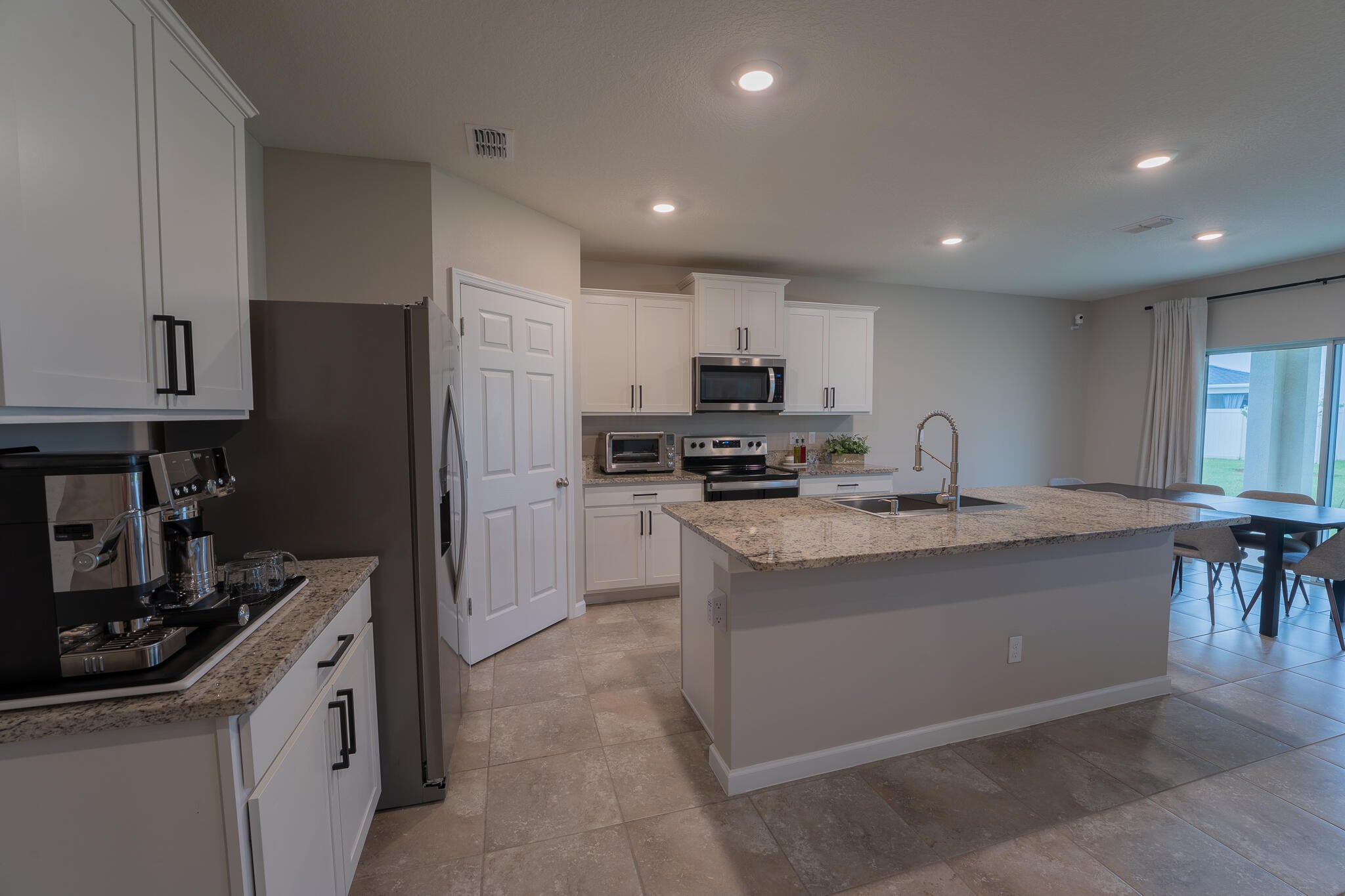 11001 SW Tessili Way