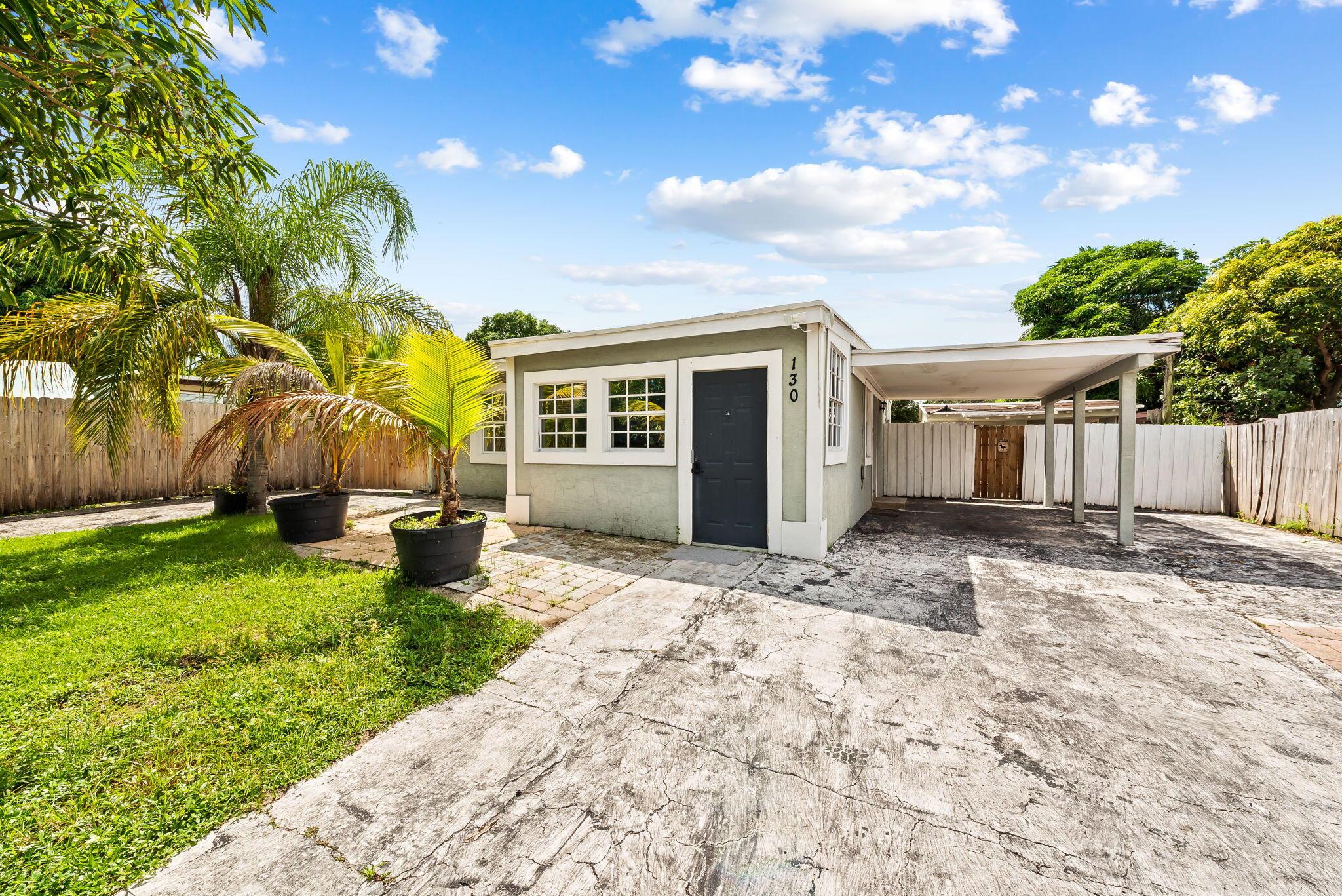 This beautifully upgraded residence offers the ideal blend of comfort, style, and peace of mind. Featuring three spacious bedrooms and a meticulously updated bathroom, the home is designed for both everyday living and effortless entertaining. Also featuring a newer roof and upgraded electrical system to ensure worry-free ownership. At the heart of the home, a modern kitchen awaits, complete with all-new cabinetry and stunning granite countertops. Additional updates include elegant new flooring, a renovated bathroom, and a 2022 central A/C system. Step outside to your private outdoor cabana, perfect for relaxing evenings or hosting. Buyer to verify all measurements and details independently.