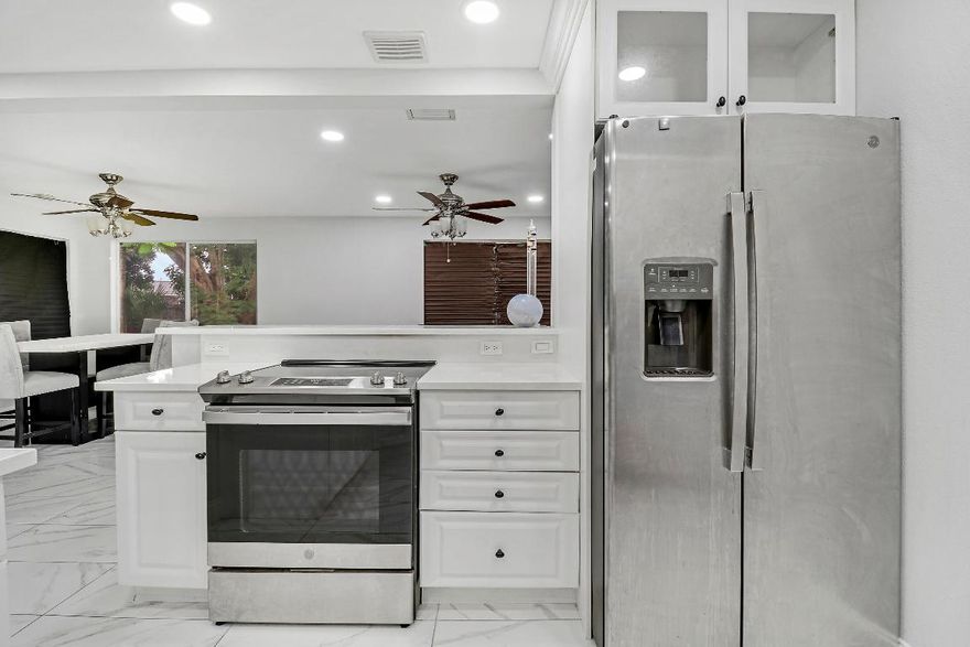 Move-in ready Lake Park gem on a rare ¼-acre lot with NO HOA! This beautifully renovated single-family home offers peace of mind and modern style with a new roof (2020) and extensive updates completed in 2021, including a redesigned kitchen, updated bathrooms, and new flooring throughout.

Enjoy a spacious, private backyard—perfect for entertaining, pets, a pool, or future expansion. The open and functional layout is ideal for everyday living, while the oversized lot provides flexibility. Conveniently located near beaches, parks, shopping, dining, and major roadways, this home combines comfort, value, and freedom with no HOA restrictions.

A fantastic opportunity to own a turn-key home in Lake Park with room to grow.