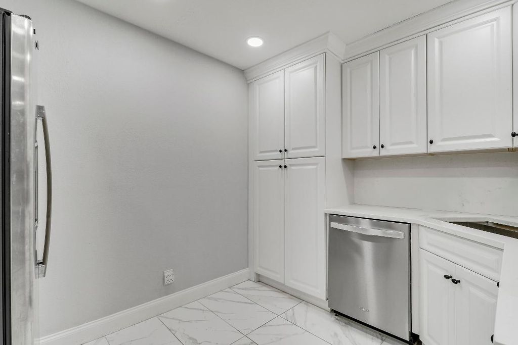 Photo of 935 Orange Drive, Lake Park, FL 33403 (MLS # R11151377)