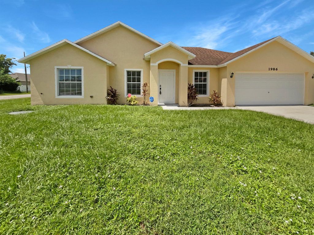 Photo of 1986 SW Cranberry Street, Port St Lucie, FL 34953 (MLS # R10919939)