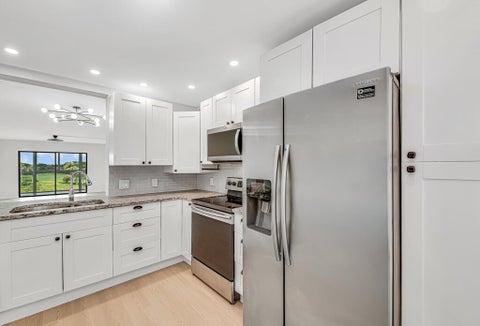 Photo of 4402 MARTINIQUE CT #D4, Coconut Creek, FL 33066 (MLS # B26089636)