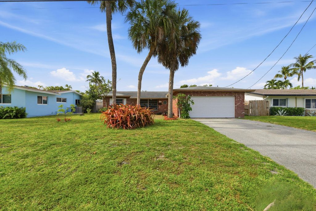 Photo of 1772 NW 38th Street, Oakland Park, FL 33309 (MLS # B26023053)