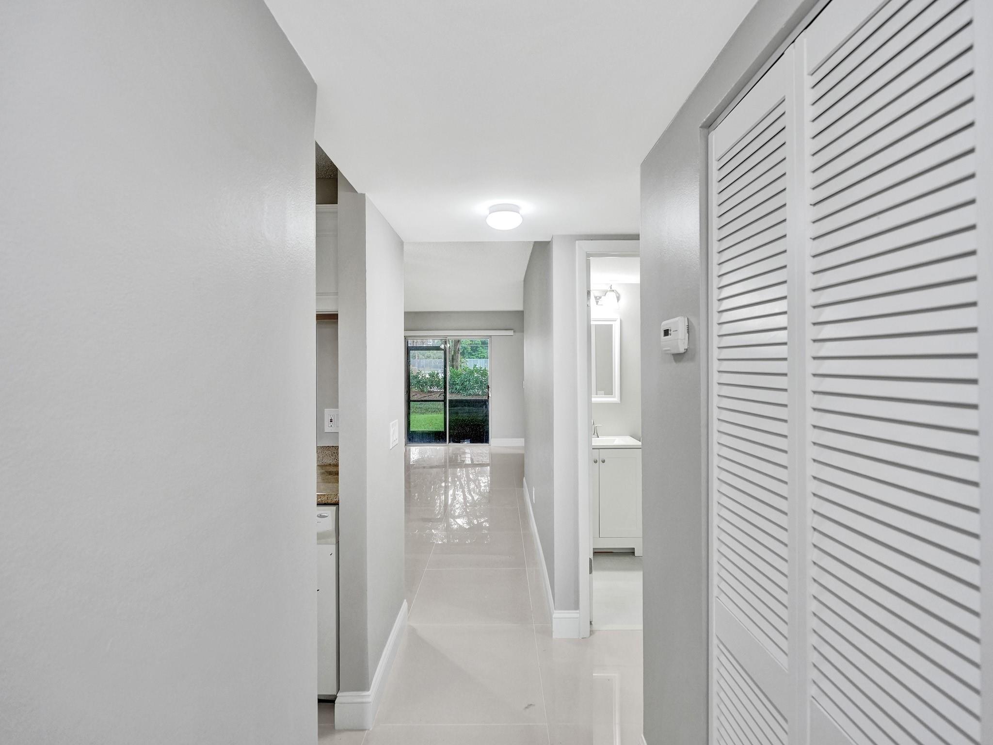 Fully renovated 2 bedroom 2 bathroom unit in Bella Grande of Pembroke Pines. Wood Laminate in bedrooms, tile in living space. New modern kitchen and bathrooms. Granite countertops. Clean condo for rent available now. Quiet neighborhood, close to shopping.