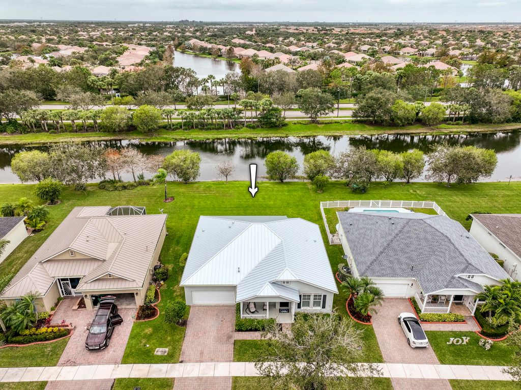 Photo of 10691 SW Waterway Lane, Port Saint Lucie, FL 34987 (MLS # R10993280)