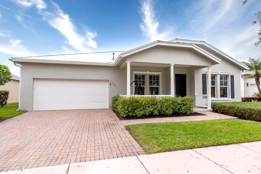 Photo of 10691 SW Waterway Lane, Port Saint Lucie, FL 34987 (MLS # R10993280)