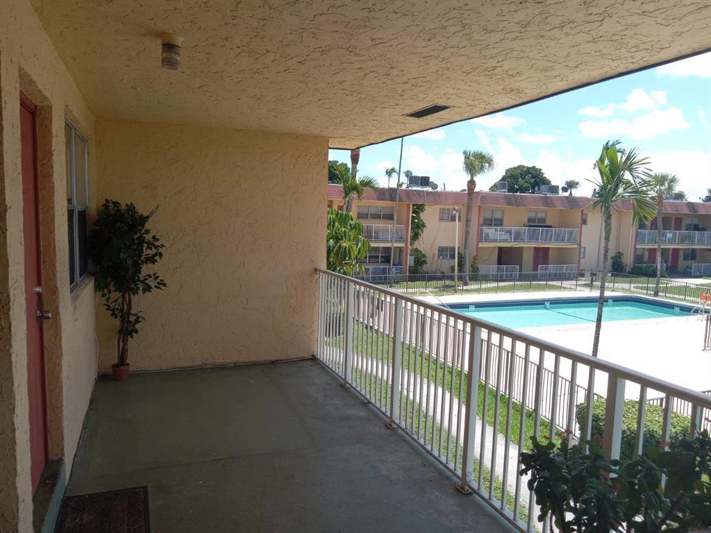 New Low price for this Upgraded 2-bedroom, 1-bathroom 2nd-floor condo. It has a Brand-New WASHER and DRYER in unit, New A/C, marble floors, an updated kitchen with newer stainless-steel appliances and granite tile counters; updated bathroom, curtains; freshly painted. Private Balcony and Assigned Parking. This unit is move-in ready. Superior to other units: Location,balcony, sunlight, w/d. Enjoy the convenience of community amenities, including pool, a playground, lawns, guest parking. Pets are welcome, with a maximum weight of 15 pounds. Great east location, walk to the Supermarket, near major transportation routes and shopping. only a mile to the beach. NO minimum credit score. This is your opportunity to Live in South Florida for an incredibly affordable price. Vacant easy to see.