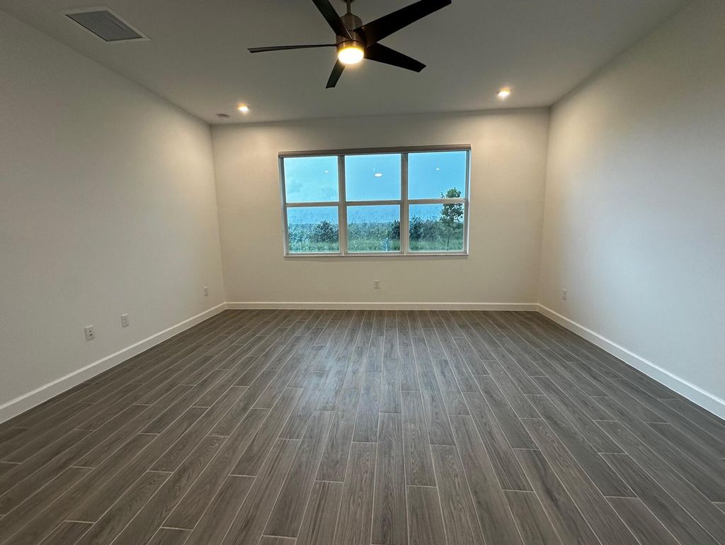 Photo of 9148 SW Remy Lane, Port Saint Lucie, FL 34987 (MLS # R11006316)