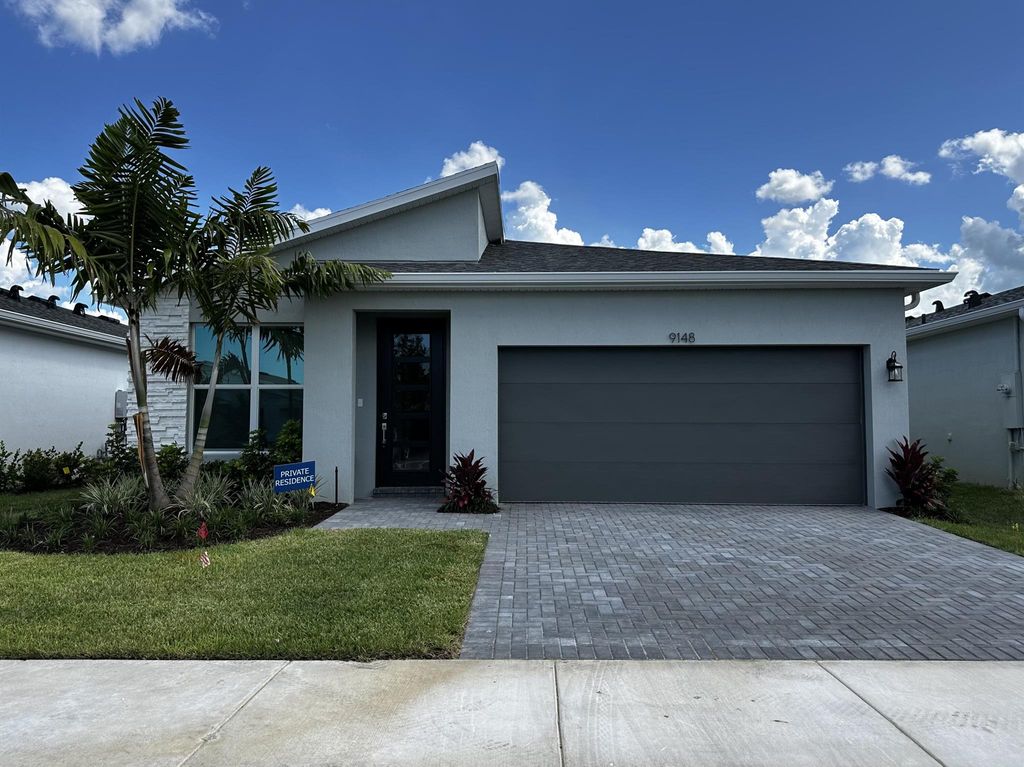 Photo of 9148 SW Remy Lane, Port Saint Lucie, FL 34987 (MLS # R11006316)
