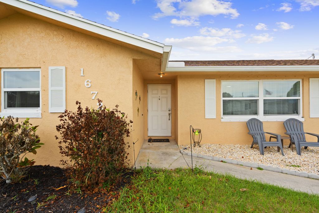 Photo of 1672 SW Angelico Lane, Port Saint Lucie, FL 34984 (MLS # B26003179)