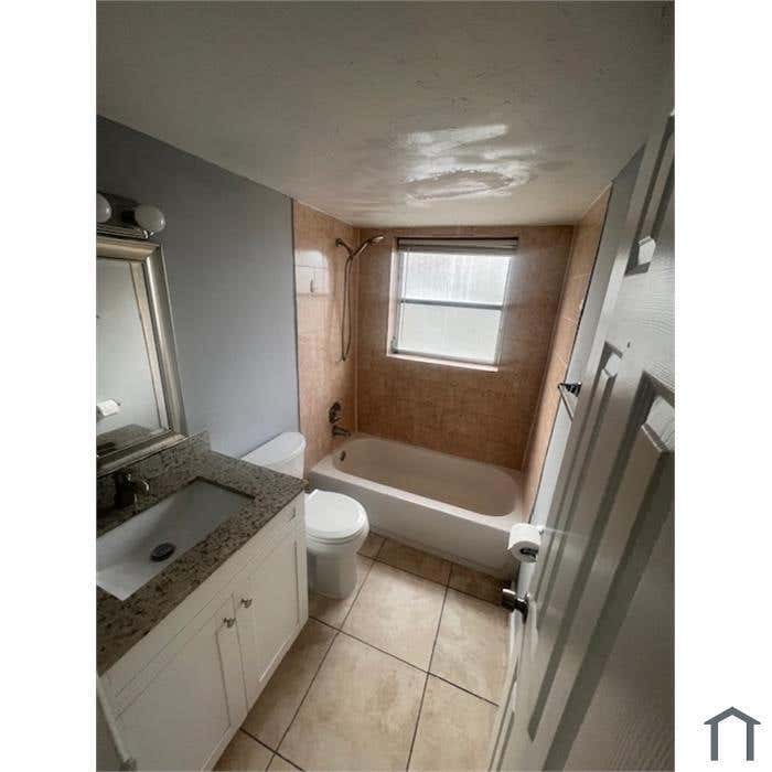 Photo of 4780 NW 24TH Court #C101, Lauderdale Lakes, FL 33313 (MLS # B26064018)