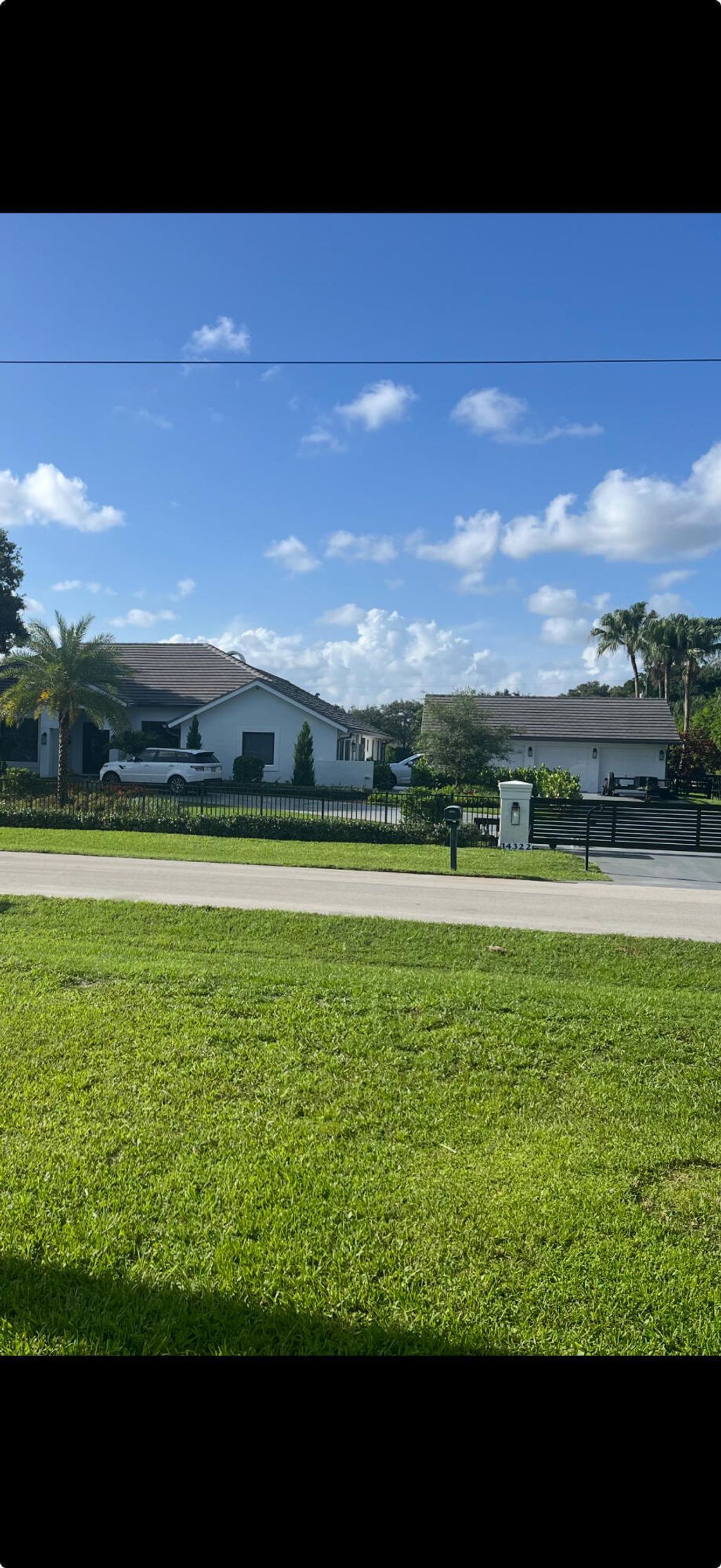 Photo of 14322 Drafthorse Lane, Wellington, FL 33414 (MLS # B26003702)