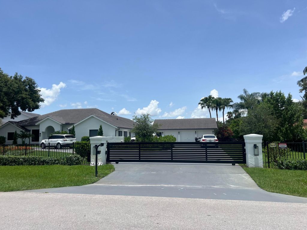 Photo of 14322 Drafthorse Lane, Wellington, FL 33414 (MLS # B26003702)