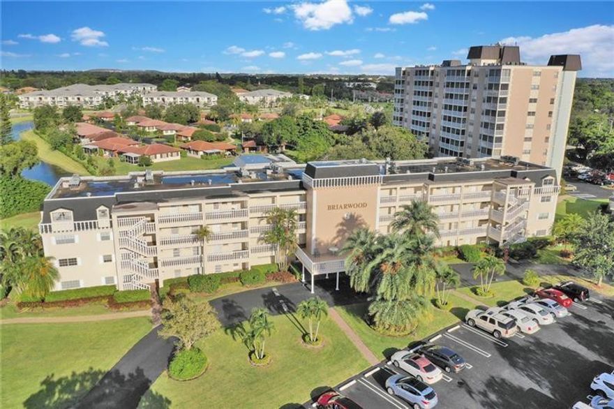 This updated 2BR / 2BA is located in the heart of downtown Coral Springs in the prestigious 55+ Briarwood Community. Located in close proximity to restaurants, shopping and hospital. Unit features renovated kitchen and bathrooms with water view, heated pool, library and clubhouse. .Driving Directions: Broker Confidential: