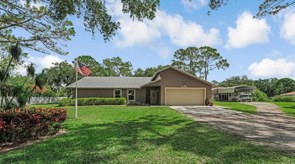 Photo of 12275 N 54th Street N, West Palm Beach, FL 33411 (MLS # R11095272)