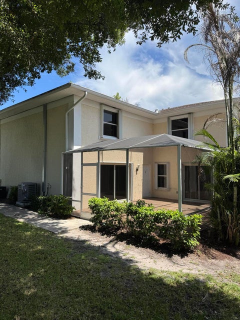 Photo of 1536 N Lawnwood Circle #3, Fort Pierce, FL 34950 (MLS # B26044180)