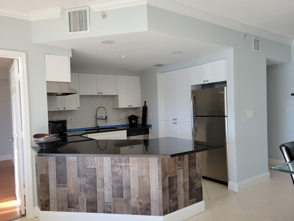 Photo of 4401 Crystal Lake Drive #102, Pompano Beach, FL 33064 (MLS # R11166726)