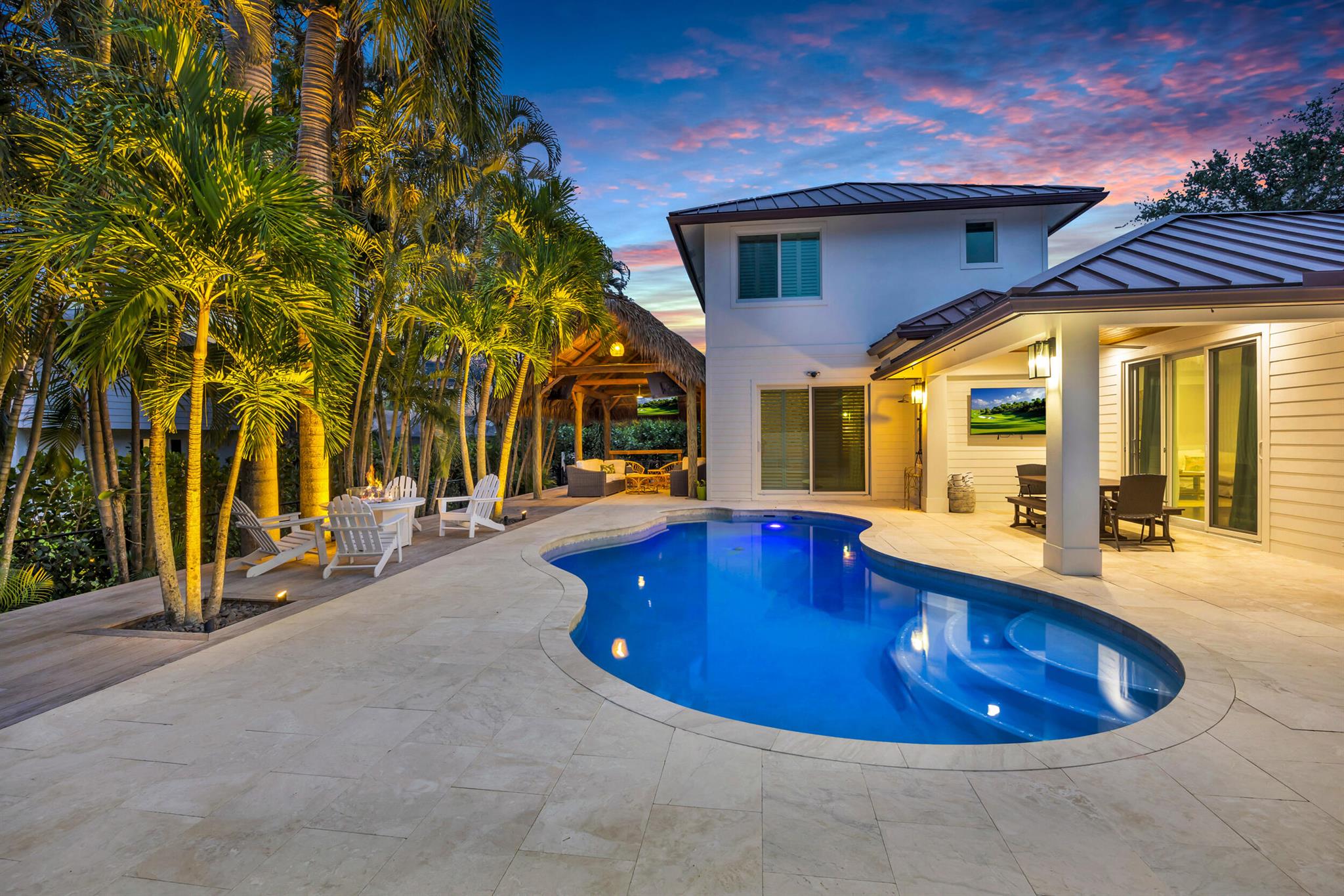 Unfurnished, available August 1, 2025 as a minimum of 6 months or annual lease. Also available for sale. Six bedrooms including two primary suites and four full bathrooms at this renovated inside and out, 3,490 sqft home in Tequesta! Open living area with kitchen and two islands, gas range. Sliding doors open to a beautifully refinished patio, and pool. Spacious outdoor tiki hut and turf. Metal roof, impact windows and doors. Five bedrooms are downstairs including a master suite and three full brand new baths. The additional primary bedroom and bath are on the second floor with a large walk-in closet. Two new ACs, two water heaters (one propane tankless). Oversized laundry room with built-ins. Located one street away from desirable Tequesta Country Club.