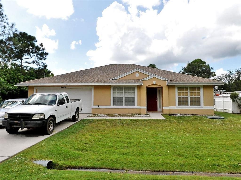 Photo of 6448 NW Foxglove Street, Port Saint Lucie, FL 34986 (MLS # R10760581)