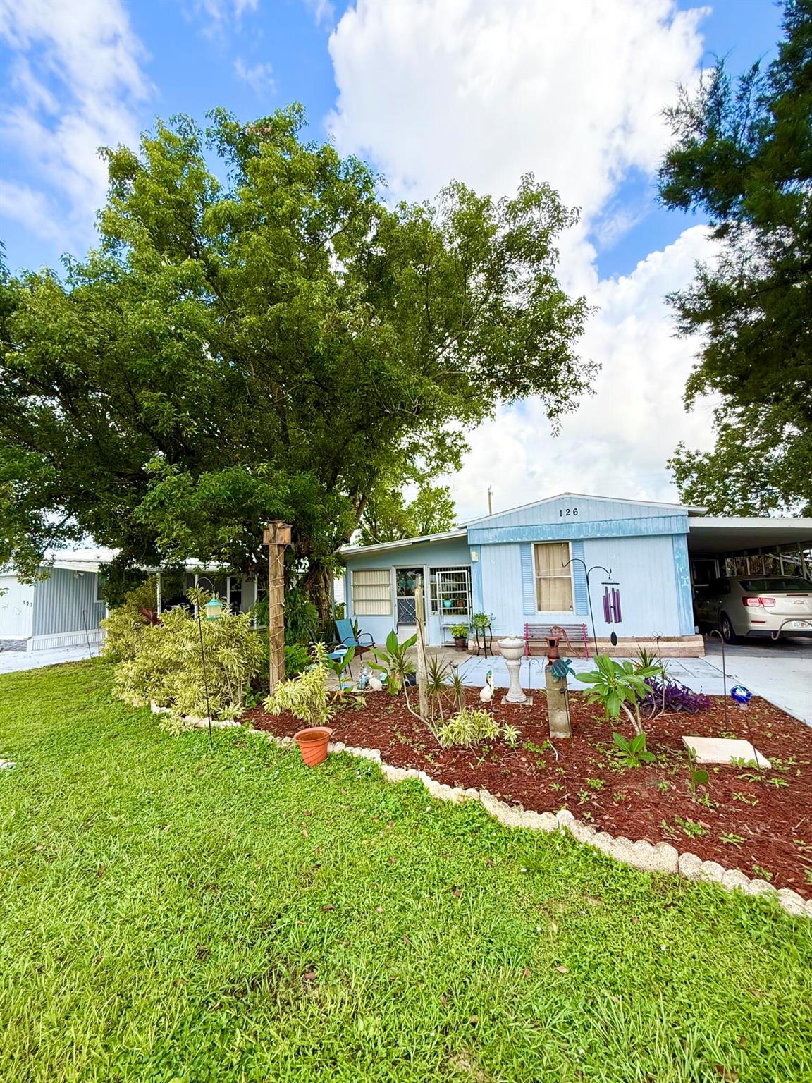 Charming 3-Bedroom, 2-Bath Home in a Peaceful NeighborhoodThis well-maintained home offers comfort, space, and endless potential. Featuring a spacious Florida room, screened-in porch, and large carport, it's perfect for enjoying Florida living year-round. The oversized yard is shaded by mature trees, with two sheds and plenty of room for a garden. Whether you're looking for the perfect place to retire or a cozy space for your family, this home checks all the boxes. Located in a quiet, friendly neighborhood--sellers are highly motivated, so bring your best offer!