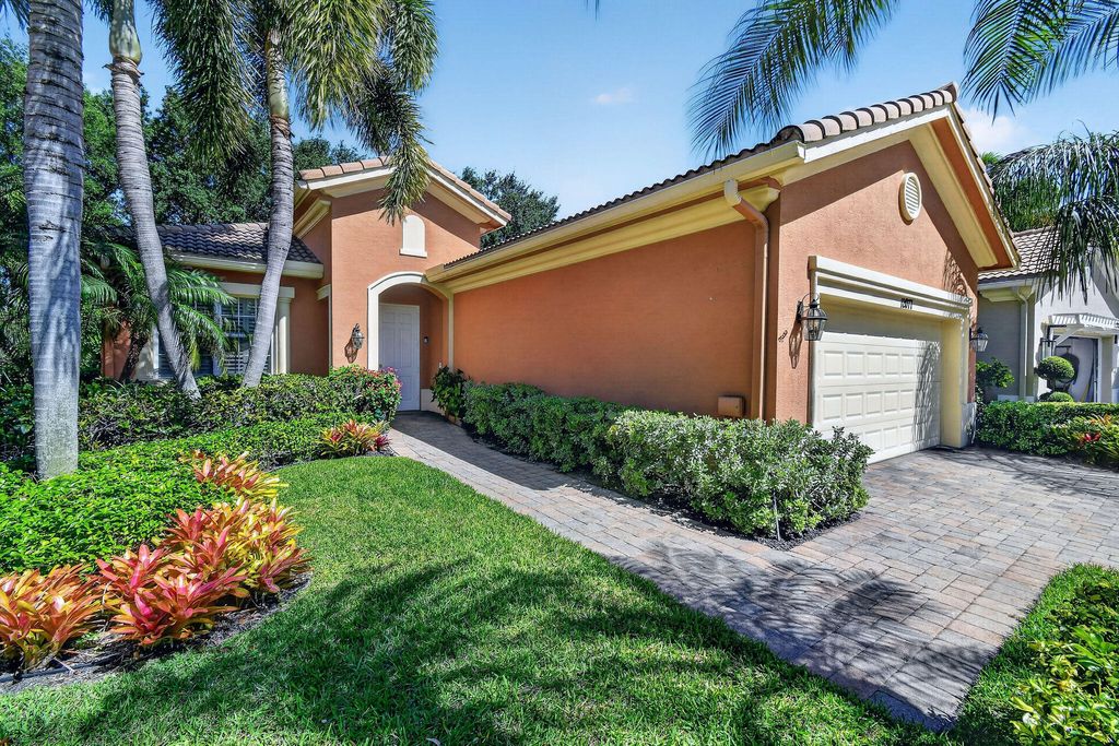 Photo of 12077 Aviles Circle, Palm Beach Gardens, FL 33418 (MLS # B26023732)