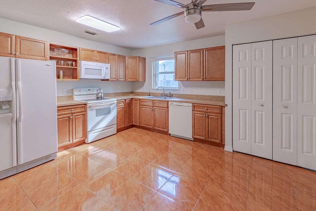 Photo of 2830 SE Cabana Lane, Port Saint Lucie, FL 34952 (MLS # R11108009)