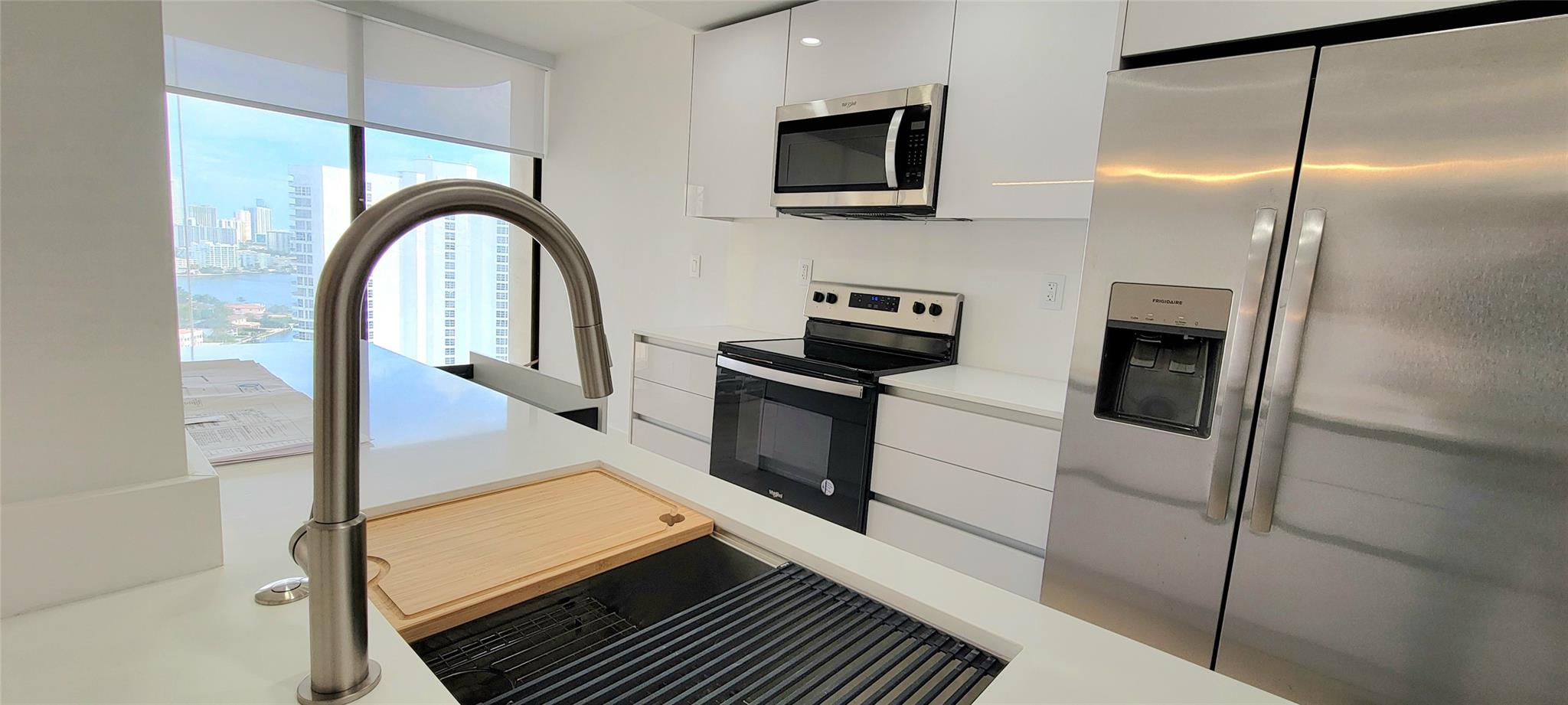 Available immediately. Assessment fully paid by seller! Be the first to move into this newly renovated high floor unit at Turnberry Towers. Renovations done by 4 Albrecht Group Inc. with no expense spared. Abundance of of custom Lioher kitchen cabinetry and Kraus Kore kitchen workstation, white quartz countertop. All new flooring in living areas. Motorized window shades including blackouts. Custom LED lighting in all rooms with LED lighting strips in master bedroom and living room. Custom built-in closets in both bedrooms. Bonus 3rd room can be used as 3rd bedroom, den or office. Most desirable Aventura location. Walking distance to Don Sofer Exercise Trail. Easy to show. Call today. Please see broker remarks.