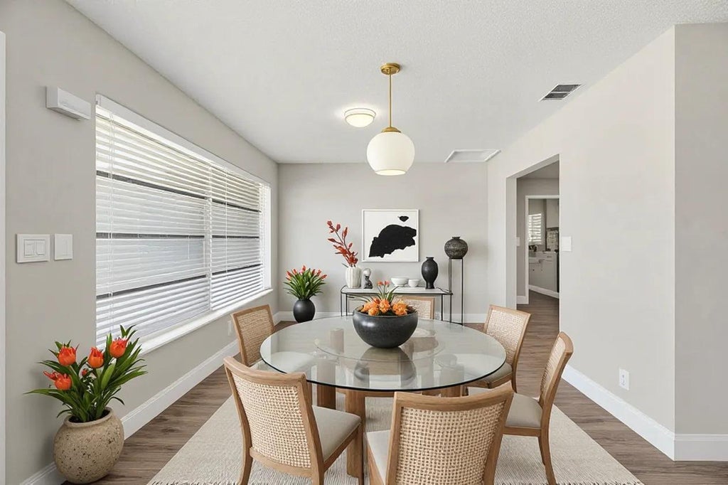Photo of 207 BAYBERRY Drive, Lake Park, FL 33403 (MLS # B26081704)