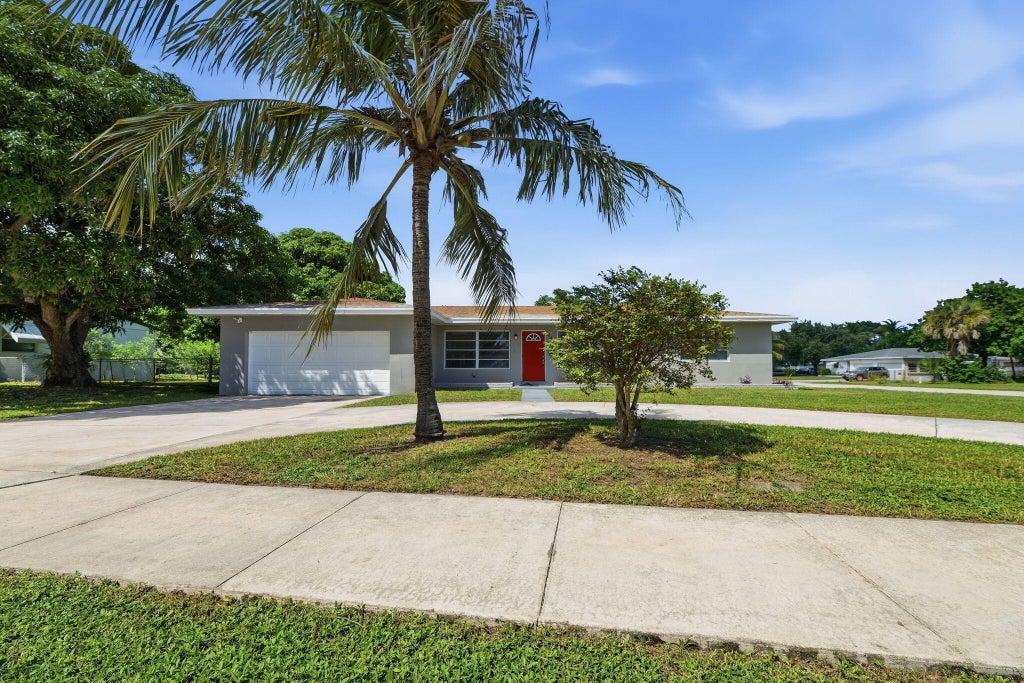 Photo of 207 BAYBERRY Drive, Lake Park, FL 33403 (MLS # B26081704)