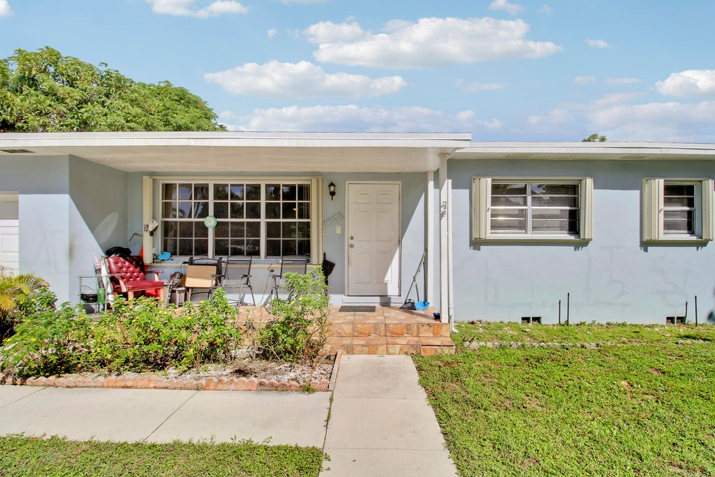 Photo of 1744 Crestwood Boulevard, Lake Worth, FL 33460 (MLS # B26091465)