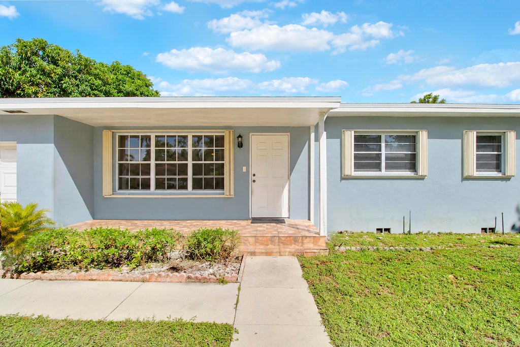 Photo of 1744 Crestwood Boulevard, Lake Worth, FL 33460 (MLS # B26091465)