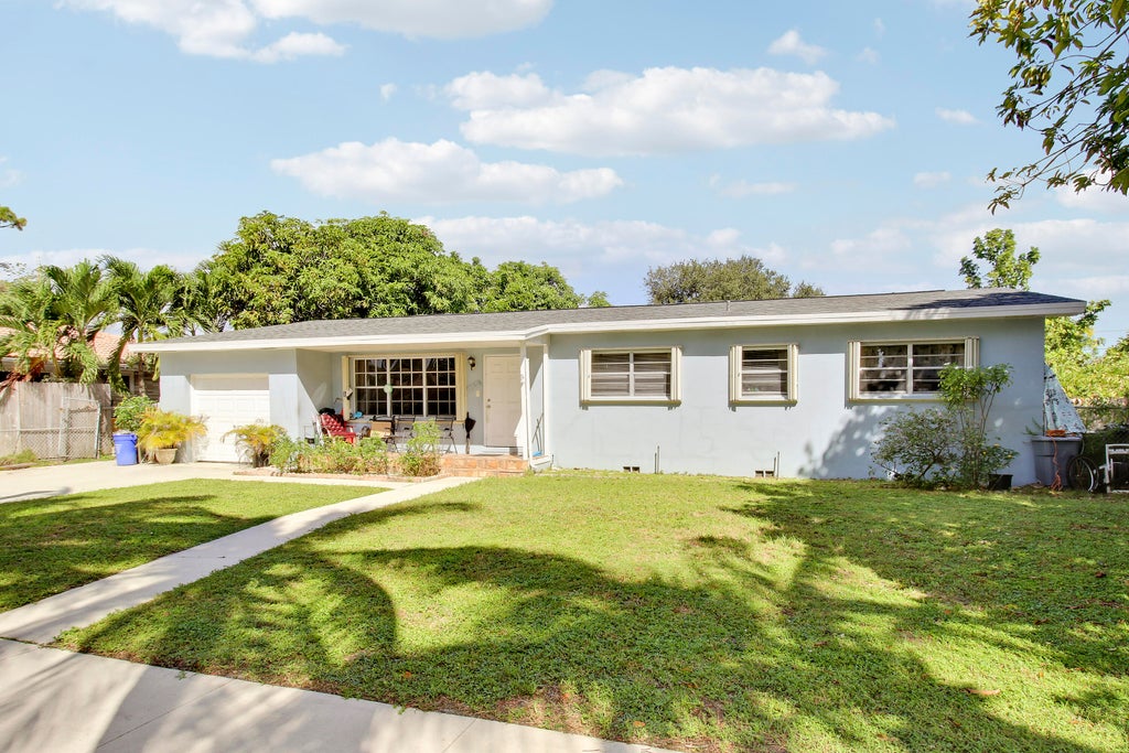 Photo of 1744 Crestwood Boulevard, Lake Worth, FL 33460 (MLS # B26091465)