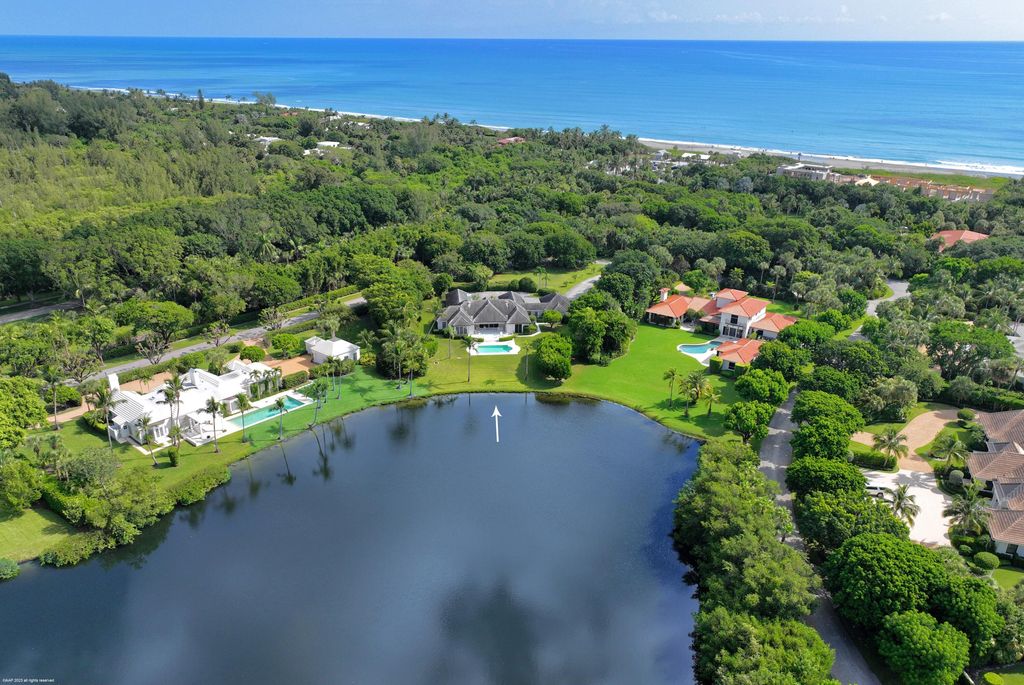Photo of 4 Bassett Creek Trail N, Hobe Sound, FL 33455 (MLS # R10920298)