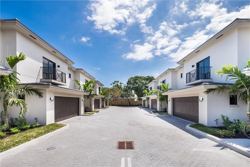 **ONLY 3 UNITS LEFT** BRAND NEW TOWNHOME OFFERING ACROSS FROM THE OAKLAND PARK CULINARY ART, MODERN CONTEMPORARY STYLE, TWO STORY 2200 SQUARE FOOT UNITS FULL TWO CAR GARAGE WITH FIRST FLOOR LIVING. QUARTZ WHITE COUNTERS WITH LIGHT GREY STRIATIONS, ISLAND EATING AREA. OPEN SPACIOUS FLOOR PLAN LEADING TO COVERED PATIO ENTRANCES. REAR UNIT COMES WITH EXTRA LARGE PRIVATELY FENCE YARD. ENSUITE DOUBLE VANITY MASTER BATHROOM. SECOND BATHROOM WITH TUB. 1.5 MILES TO THE BEACH, 10 MIN WALK TO SHOPS ON WILTON DR.