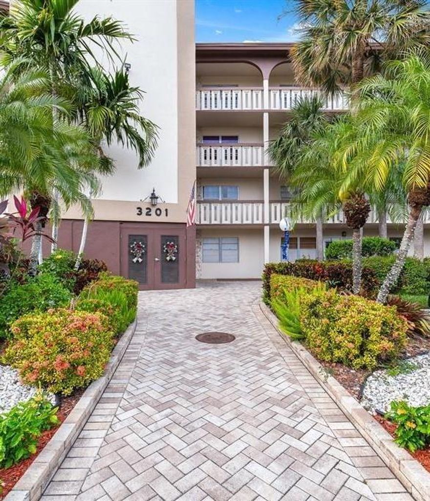 Bright 3rd-floor condo featuring an enclosed balcony overlooking peaceful gardens. Just steps from the pool and close to the elevator. Located in Wynmoor, a gated 55+ golf community with 24/7 security. Enjoy resort-style amenities including an 18-hole golf course, tennis and pickleball courts, pools, fitness center, café, theater, clubs, and free community bus service. Convenient access to Florida’s Turnpike, I-95, shopping, and dining.