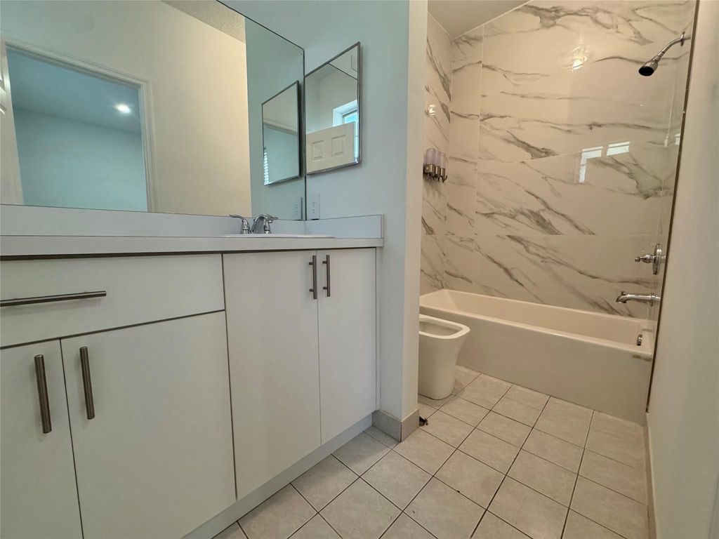 Photo of 1007 NW 100th Ave #1007, Pembroke Pines, FL 33024 (MLS # F10538280)