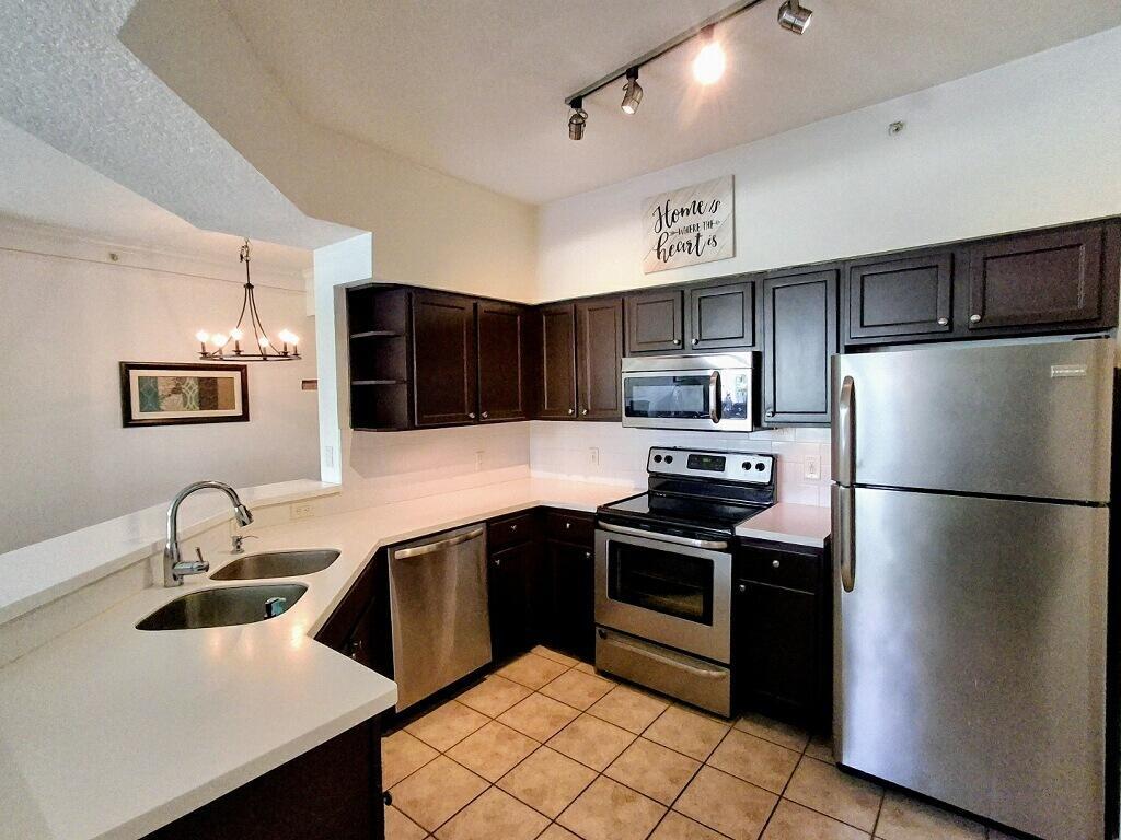 Simply Stunning!! Sought after 1 bedroom 1 bath patio model on the first floor in Resort Style Mezzano. Property features a bright and open floor plan, volume 9 ft ceilings, gorgeous renovated kitchen with stainless appliances and corian counter tops, wood like flooring , updated vanity in bathroom, garden tub, large walk in closets and property is located just steps to the pool and all of the amenities. Mezzano is a quaint and gated community with just nine buildings. Character Property at It's Finest!!! Rent includes water, sewer and trash!! Hurryyyy!!
