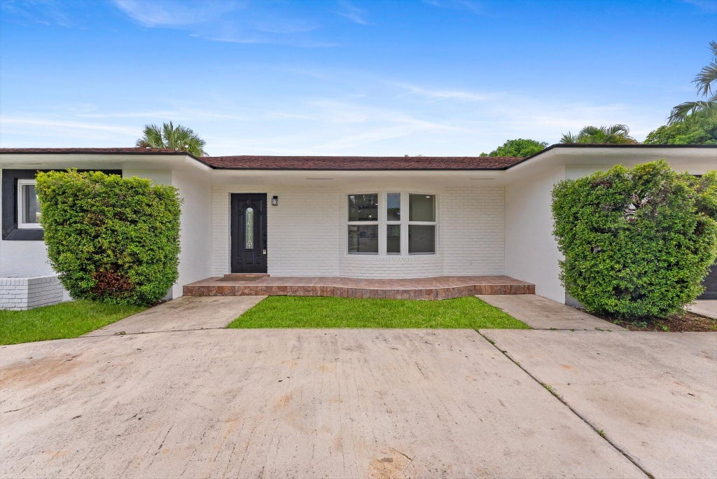 Photo of 1660 40TH Street, West Palm Beach, FL 33407 (MLS # B26085128)