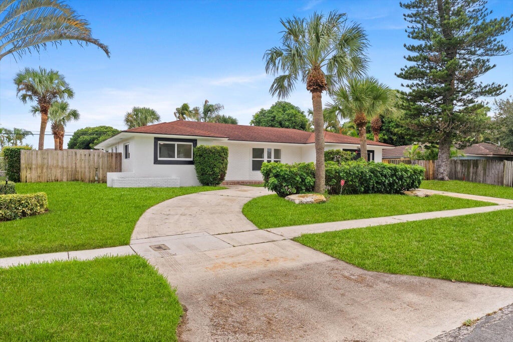 Photo of 1660 40TH Street, West Palm Beach, FL 33407 (MLS # B26085128)