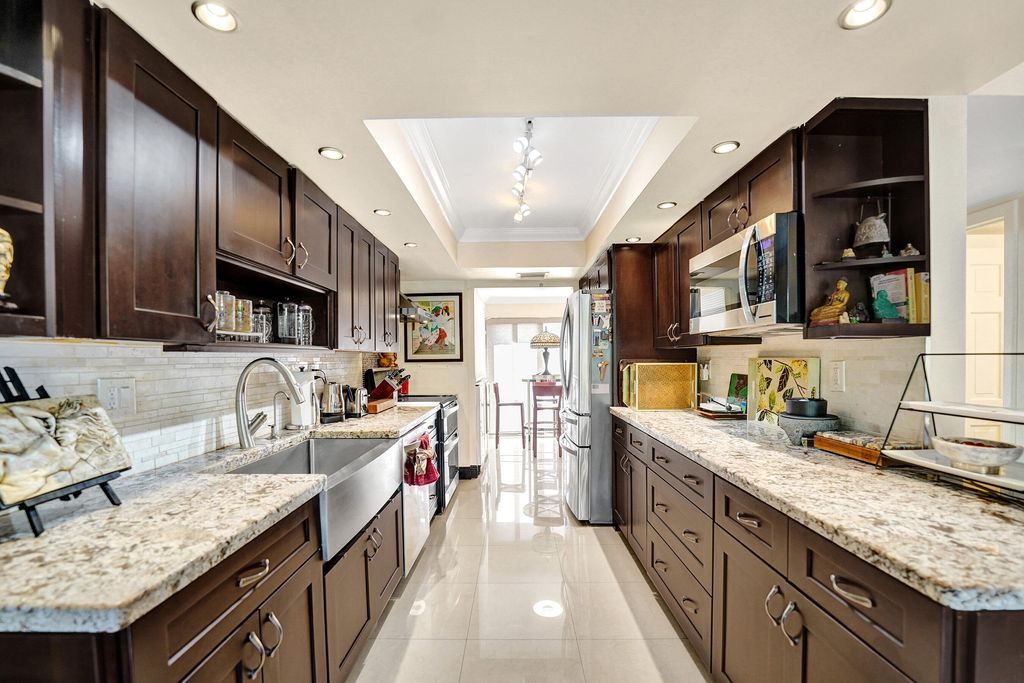 Photo of 403 Dunwoody Lane #38, Hollywood, FL 33021 (MLS # B26000446)