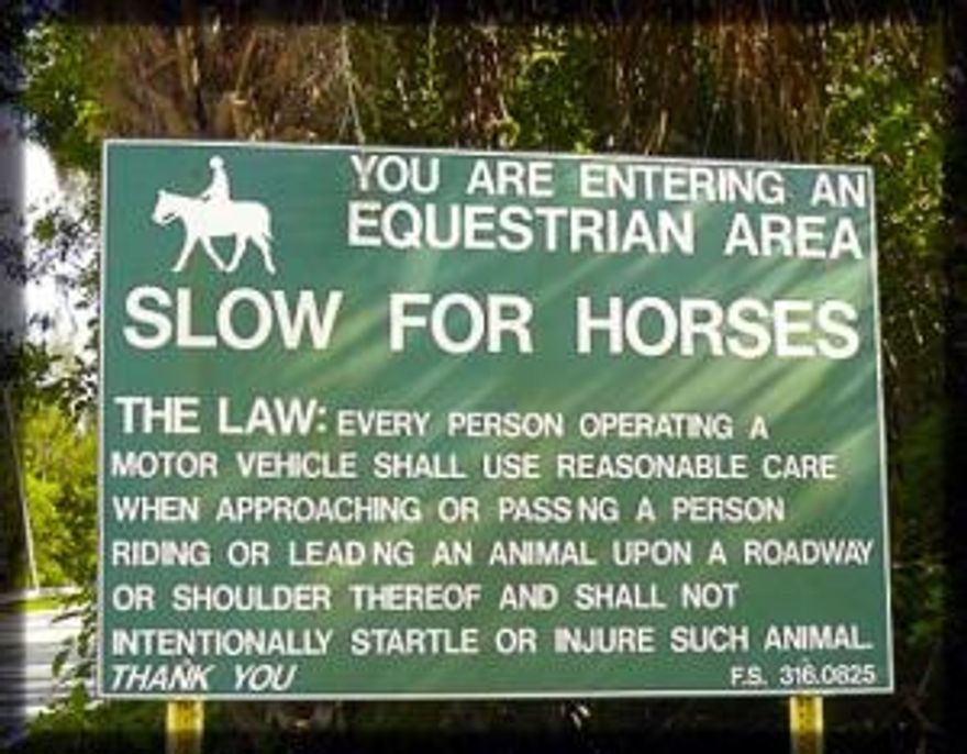 Great opportunity to live in Jupiter Farms on 2.5 Acres. Corner Lot high and dry.