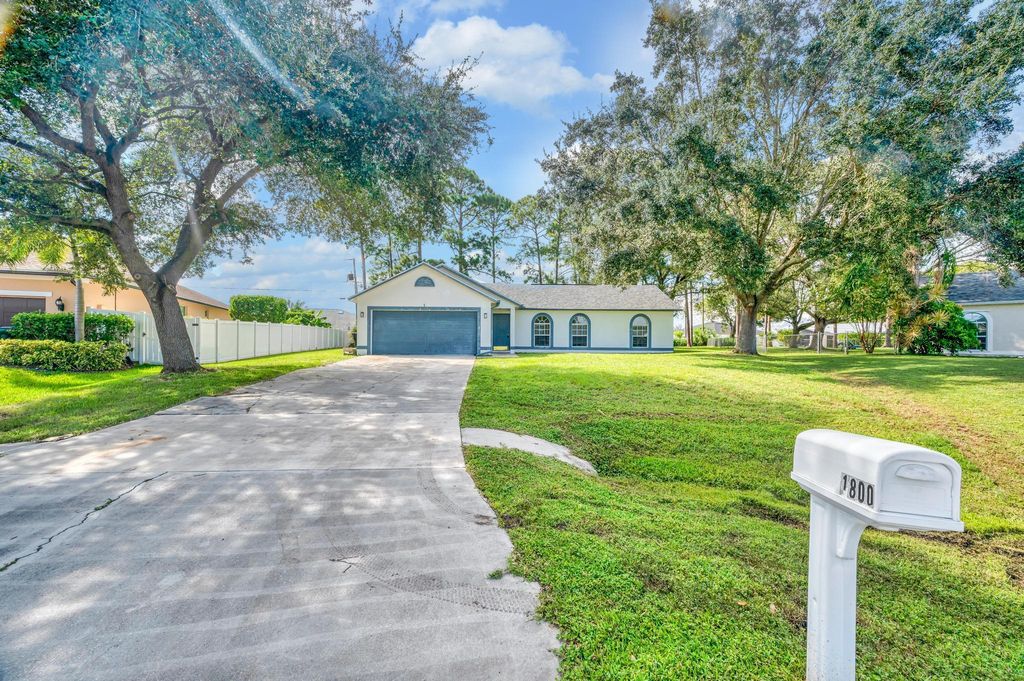 Photo of 1800 SW Glenco Street, Port Saint Lucie, FL 34953 (MLS # R11020013)