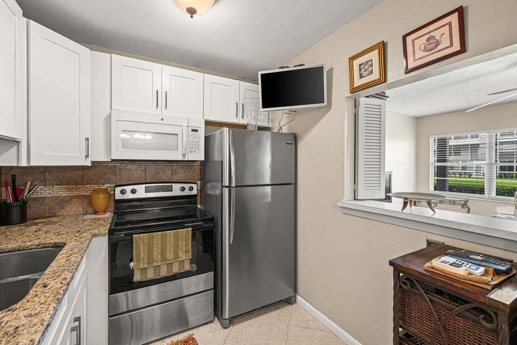 Photo of 175 Suffolk E, Boca Raton, FL 33434 (MLS # B26037123)