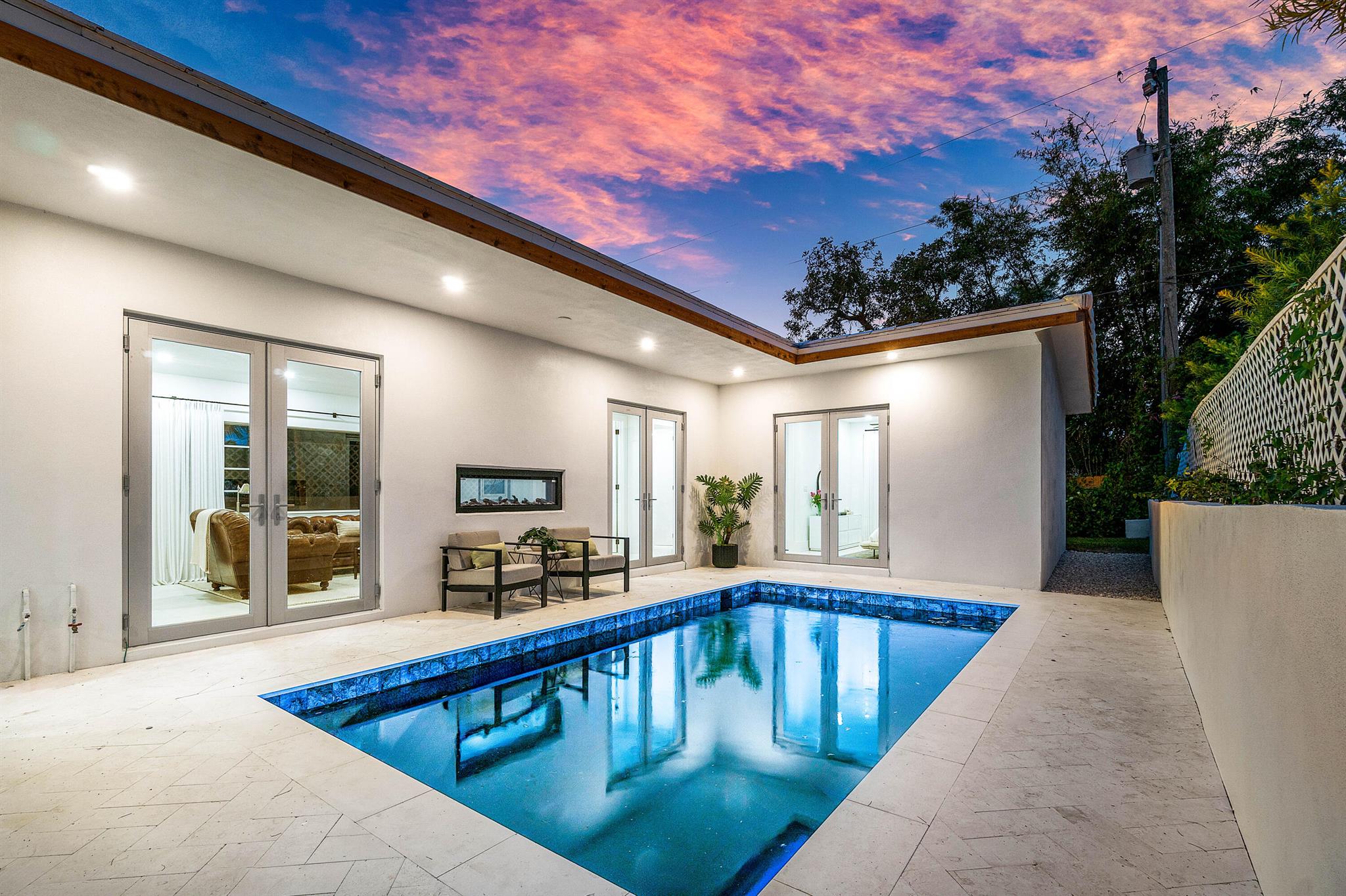 Presenting 2330 Lake Avenue, a home that offers both timeless historic charm and the peace of mind of all-new construction. Reimagined in 2025 by award-winning Flamingo Park Development, this single-story showpiece has been fully transformed while honoring the character of one of West Palm Beach's most beloved neighborhoods.Behind its classic facade lies a brand-new addition, resort-style pool, and design-forward interiors featuring 4 bedrooms and 3.5 bathrooms. With a brand new roof, brand new impact windows and doors, brand new pool, and completely updated systems, this home is ready to begin its next chapter.