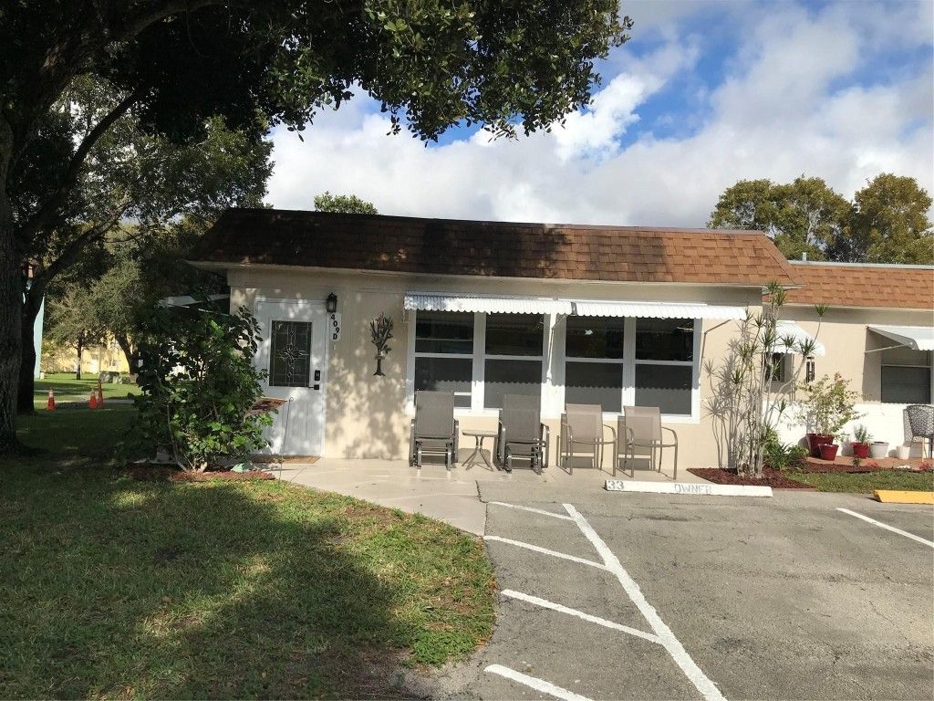 Photo of 409 SW Natura Avenue #D, Deerfield Beach, FL 33441 (MLS # F10548615)