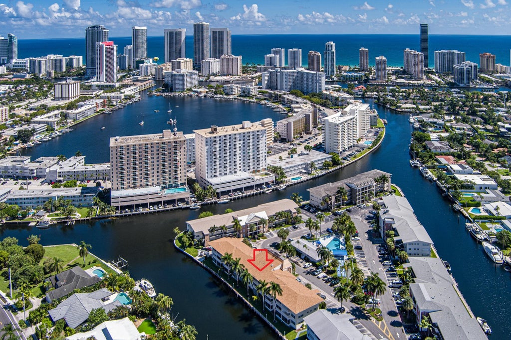 Photo of 460 Paradise Isle Boulevard #101, Hallandale Beach, FL 33009 (MLS # B26088412)