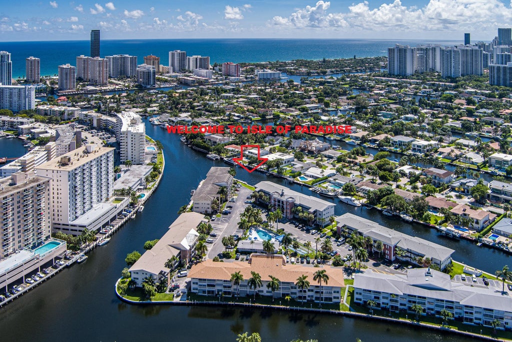 Photo of 460 Paradise Isle Boulevard #101, Hallandale Beach, FL 33009 (MLS # B26088412)