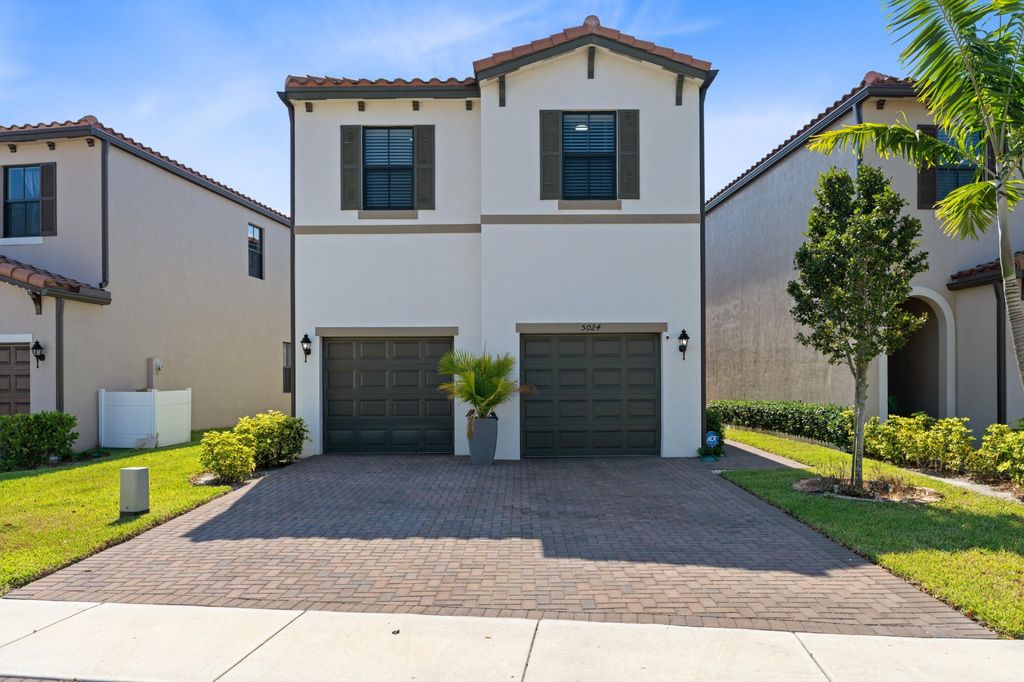 Photo of 5024 Laurel Oak Drive, Riviera Beach, FL 33410 (MLS # R10801728)