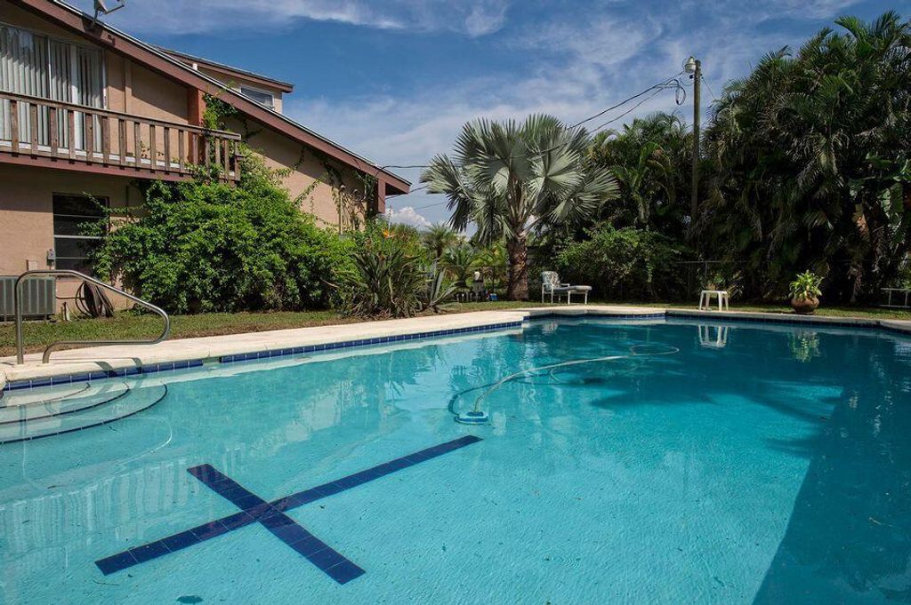 Photo of 4500 SW Boatramp Avenue, Palm City, FL 34990 (MLS # R10766548)