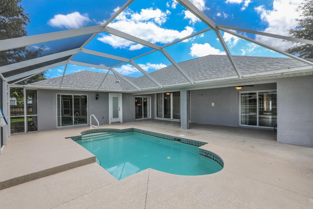 Photo of 2701 SE Brevard Avenue, Port Saint Lucie, FL 34952 (MLS # R11120204)